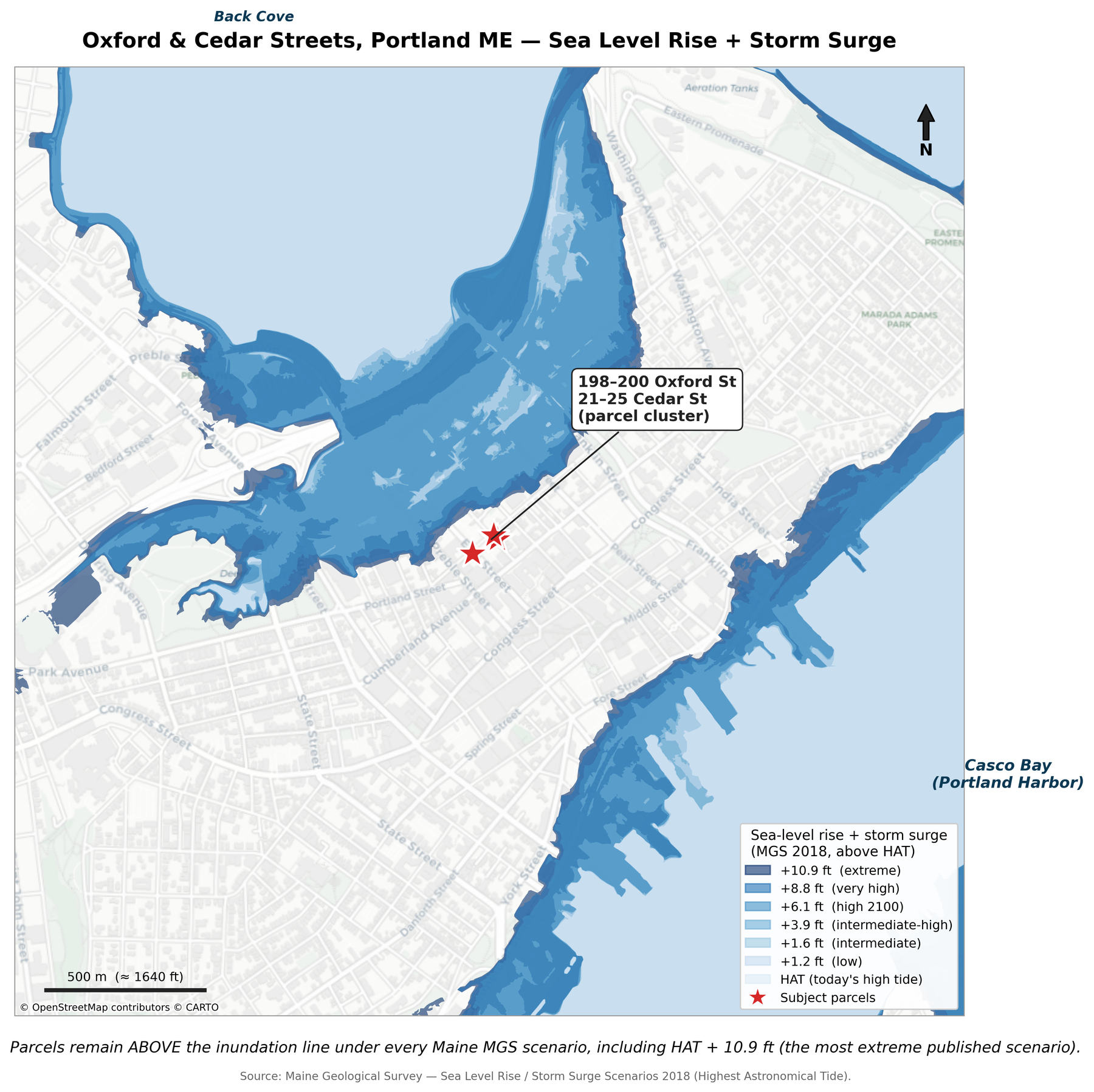 Map of Portland, Maine showing Maine Geological Survey sea-level rise and storm-surge scenarios from HAT through HAT plus 10.9 feet, rendered as nested blue polygons spreading inland from Casco Bay and Back Cove. The four subject parcels remain outside every scenario.